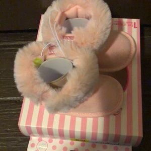 Baby pink booties, wrong size so never worn